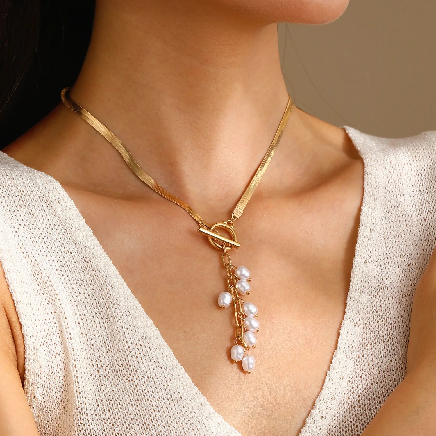 Marvelle Sculpted Knot Tassel Necklace