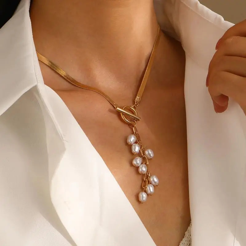 Marvelle Sculpted Knot Tassel Necklace