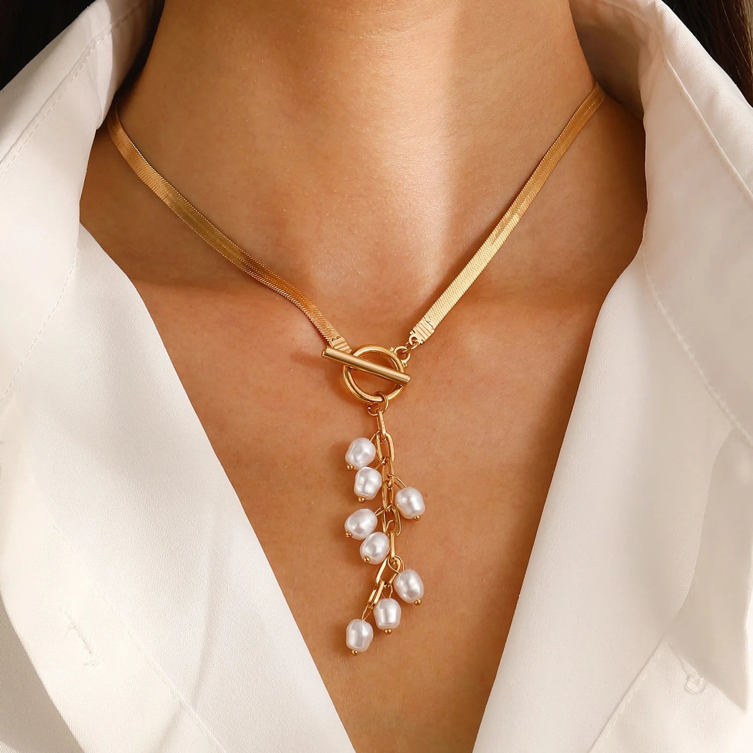 Marvelle Sculpted Knot Tassel Necklace